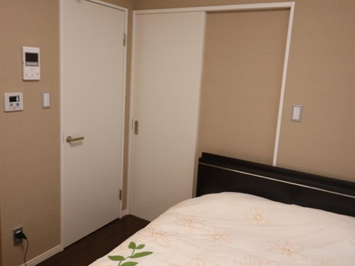 Aparthotel Mr. Kinjo In Makishi Naha Camera foto
