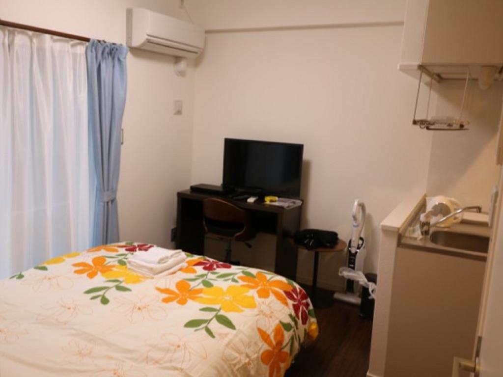 Aparthotel Mr. Kinjo In Makishi Naha Camera foto